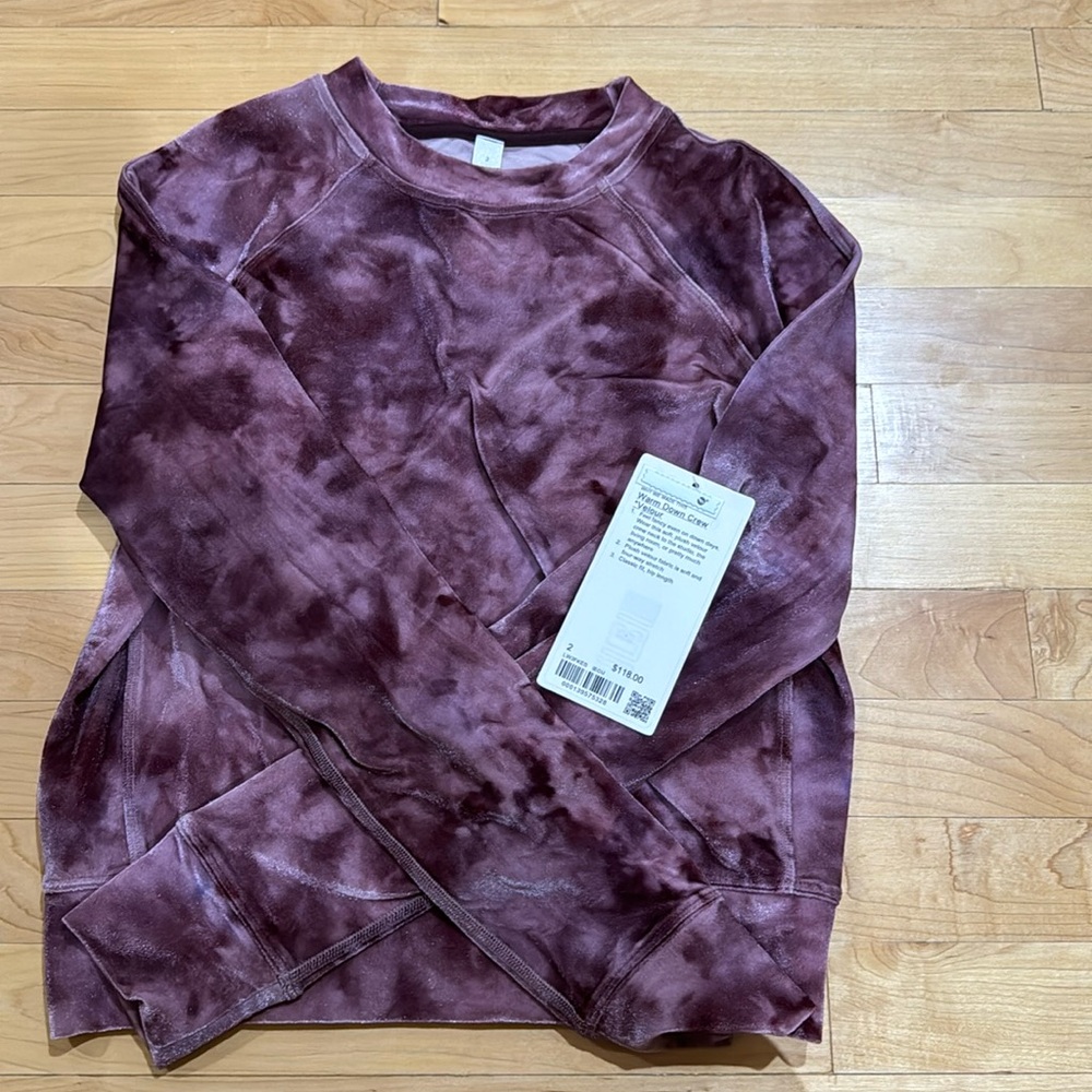 In selling a lululemon warm down crew it’s a size 2 the material is soft